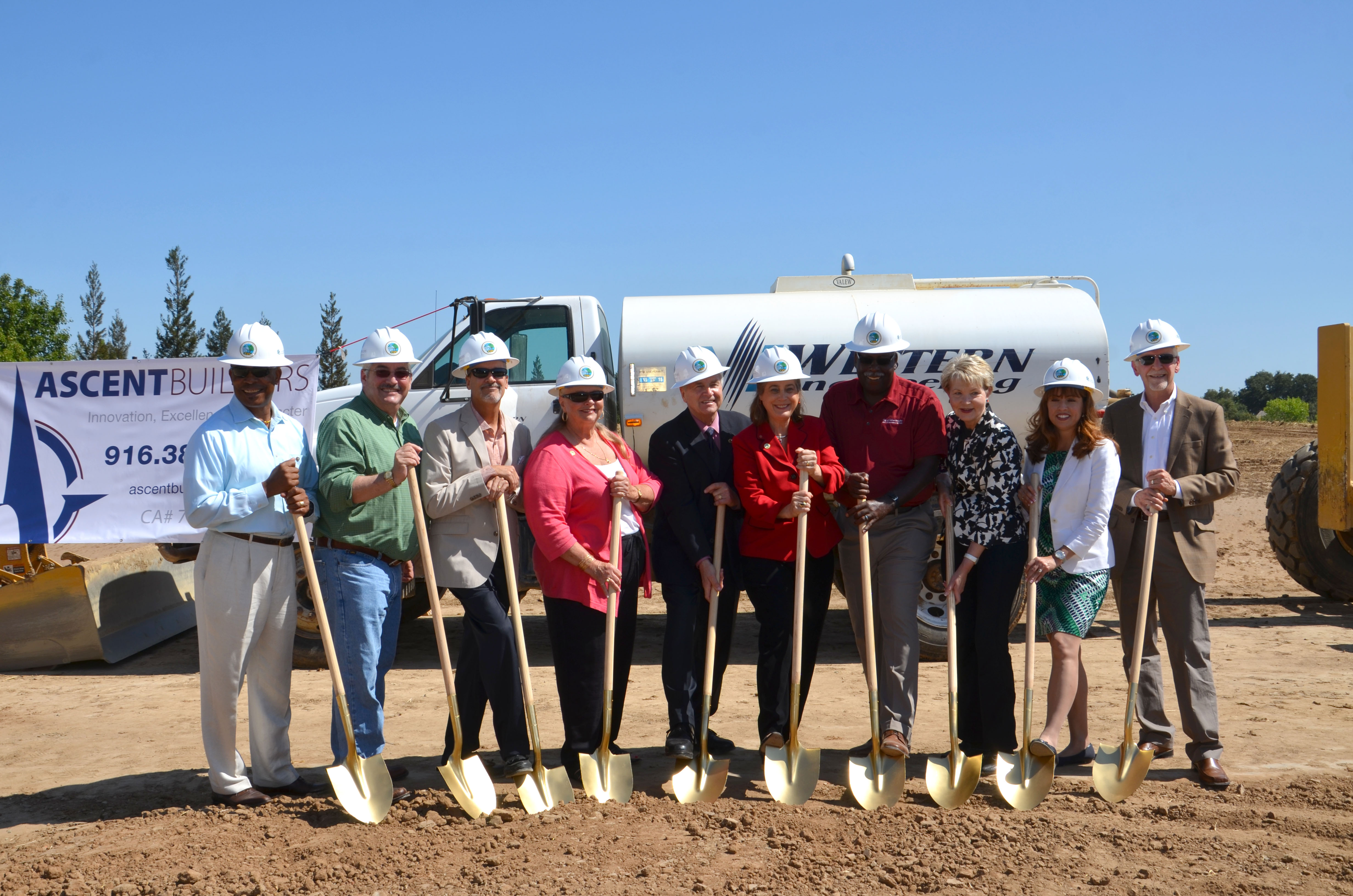 City officials don hardhats and take up shovels for the groundbreaking