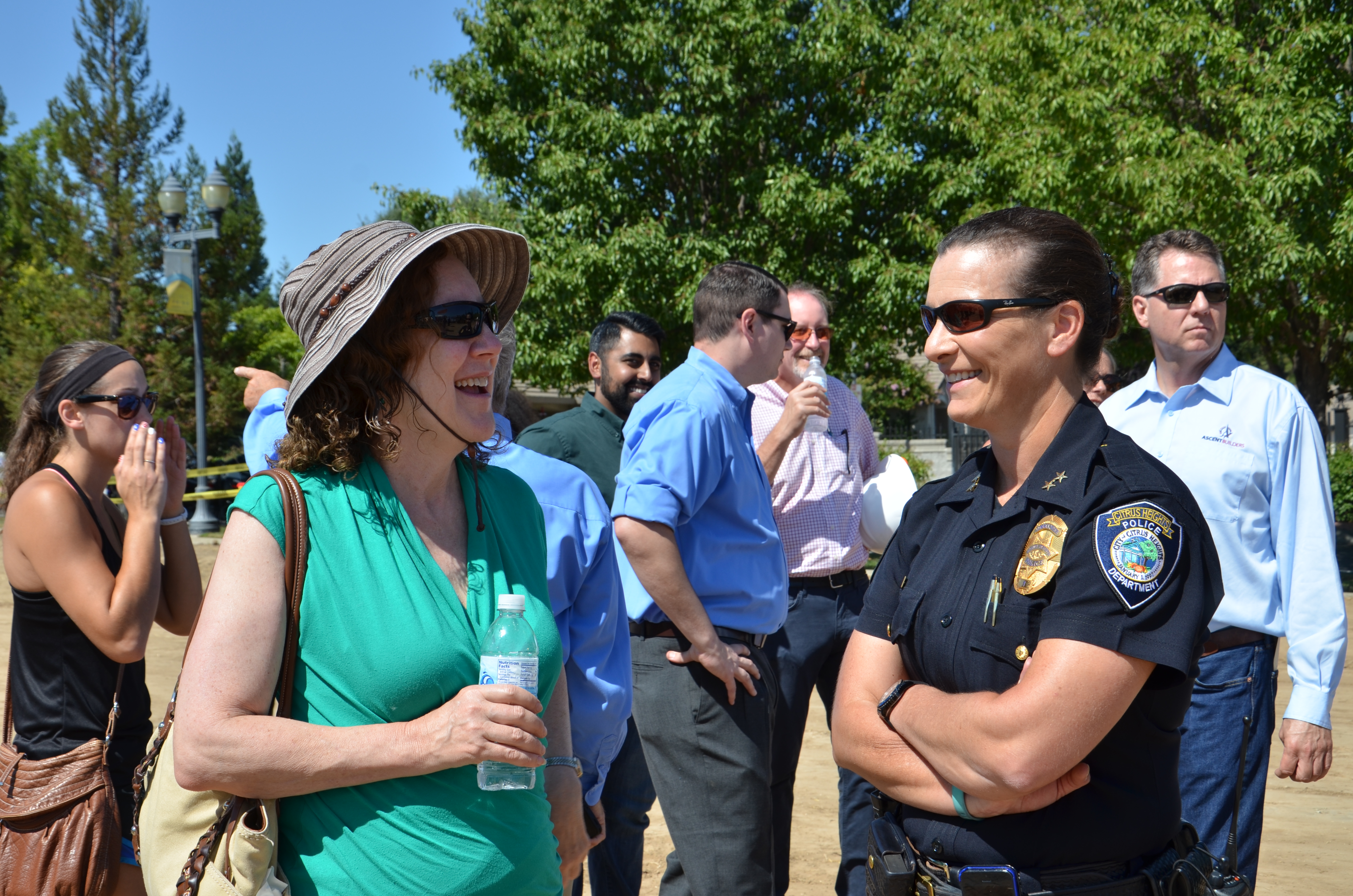 Community members and police officers mingle