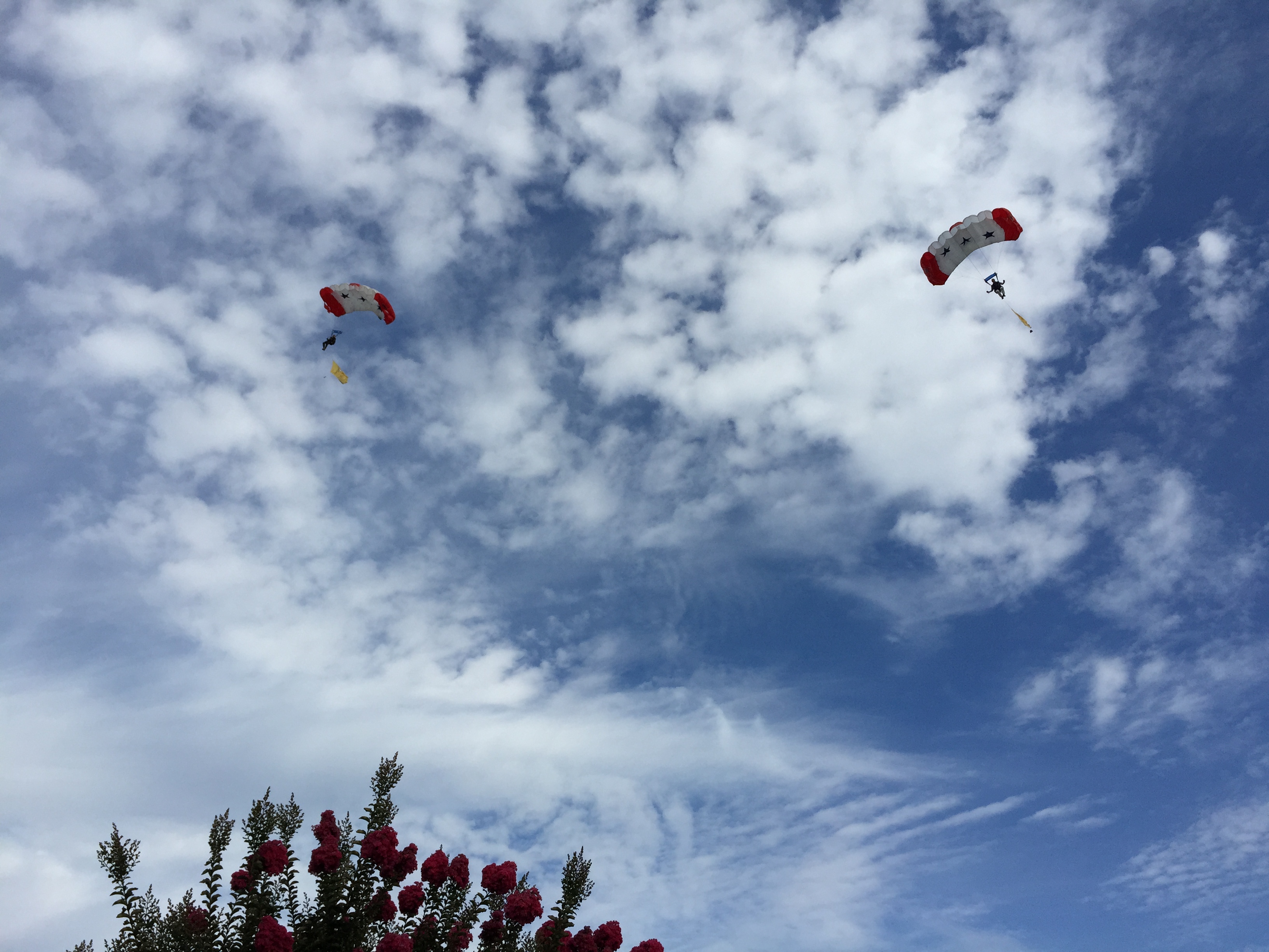Skydivers approaching the grandstand