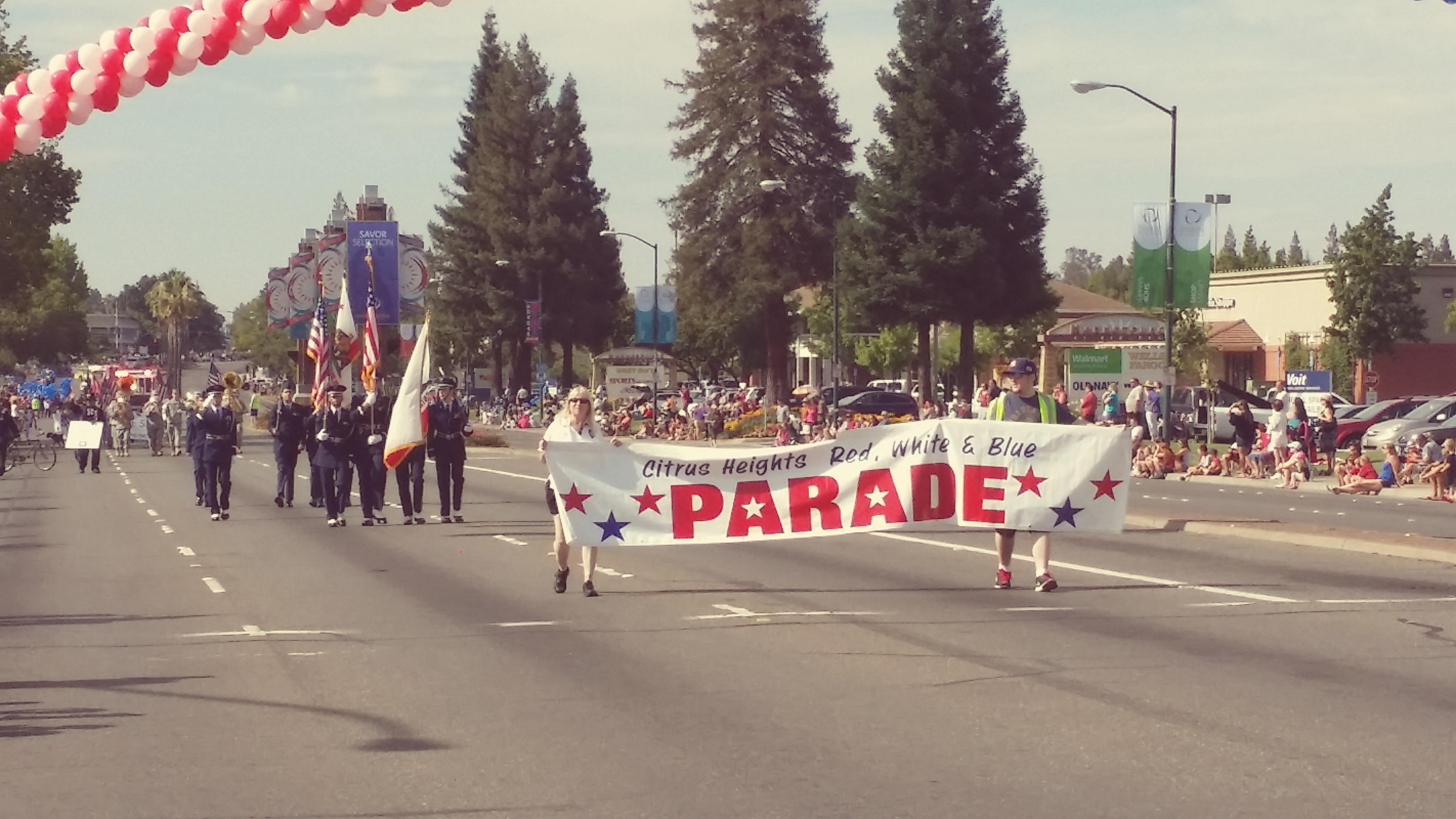 The official parade banner